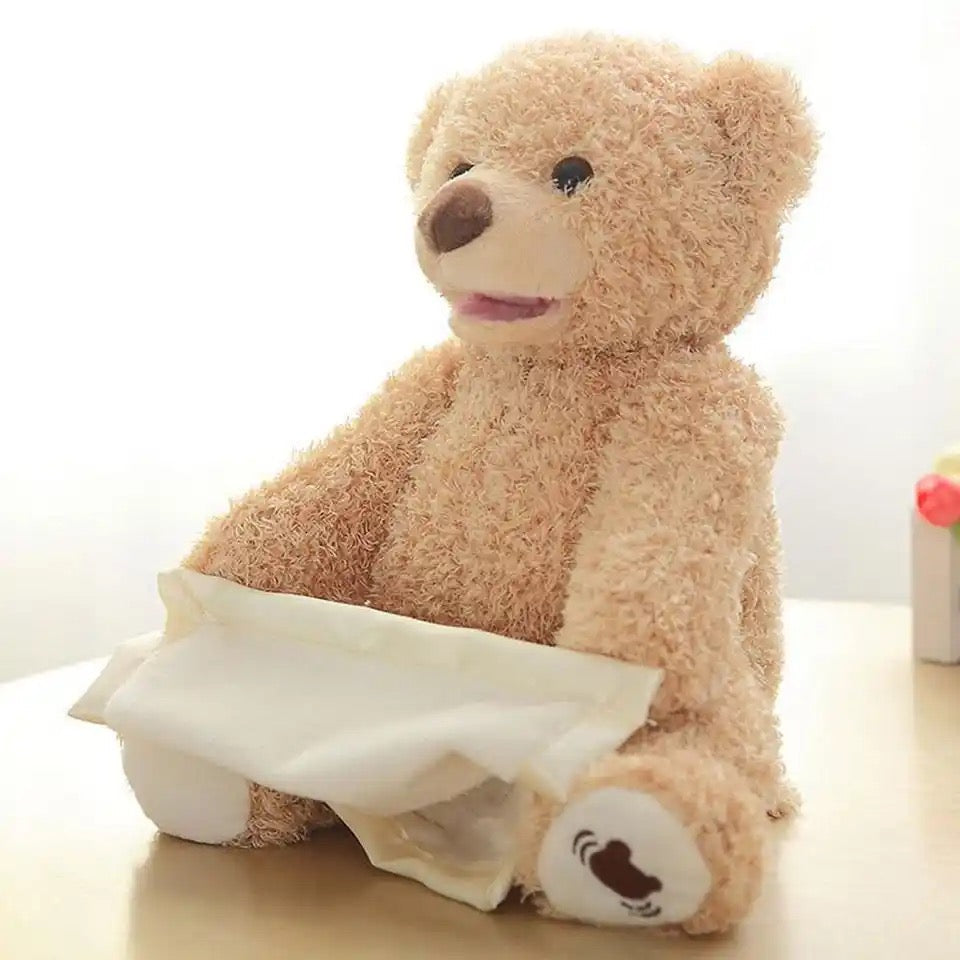 Khaki WEIQUEEN Peekaboo Bear sitting with its attached cream blanket