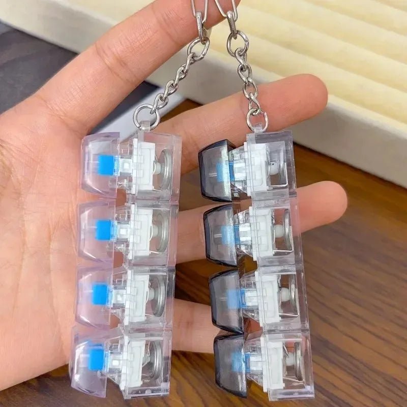 New Stress Anxiety Relief Keyboard Keychain Four Finger Button for Office Home Adults Kid Decompression Clicker Hot Gadget Gifts