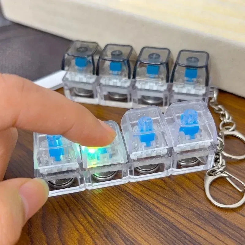 New Stress Anxiety Relief Keyboard Keychain Four Finger Button for Office Home Adults Kid Decompression Clicker Hot Gadget Gifts