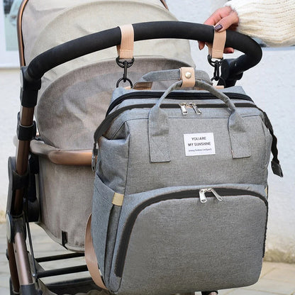 NestEase™ 3‑in‑1 Diaper Bag & Portable Rest Station