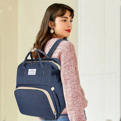 NestEase™ 3‑in‑1 Diaper Bag & Portable Rest Station