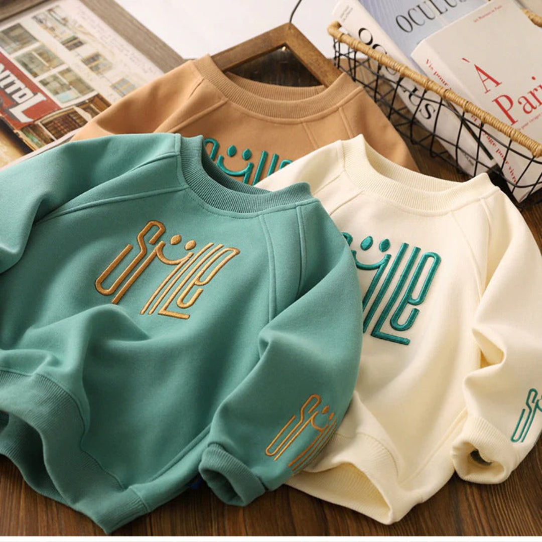 Unisex Children's Sweater Featuring a Cheerful Smile Design