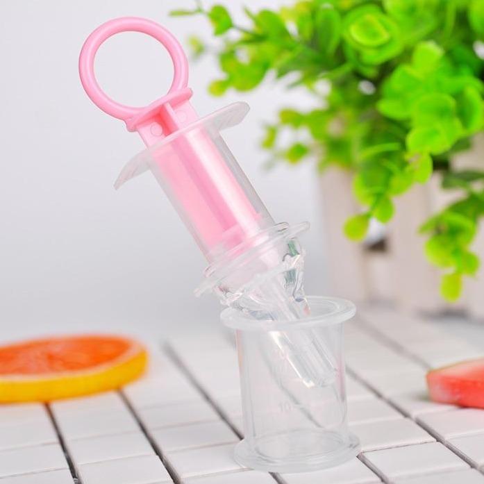Pacifier Medicine Dispenser